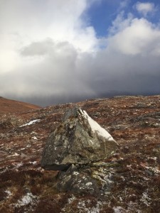 The sky in this photograph illustrates the contrast between the brief moments of sun (as indicated by the blue sky), and the dark clouds, where sleet and snow were falling.
